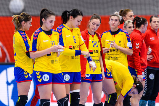 Players of Romania looks dejected