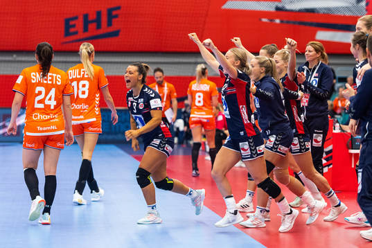 Nora Mørk and Stine Bredal Oftedal of Norway celebrate