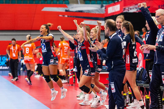 Nora Mørk and Stine Bredal Oftedal of Norway celebrate