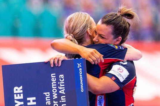 Stine Bredal Oftedal and Nora Mørk of Norway celebrate