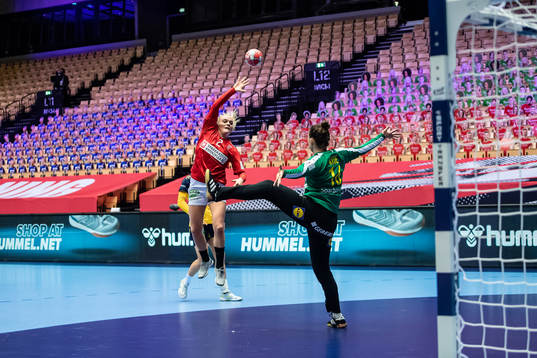 Laerke Nolsoe Pedersen of Denmark and goalkeeper Jessica