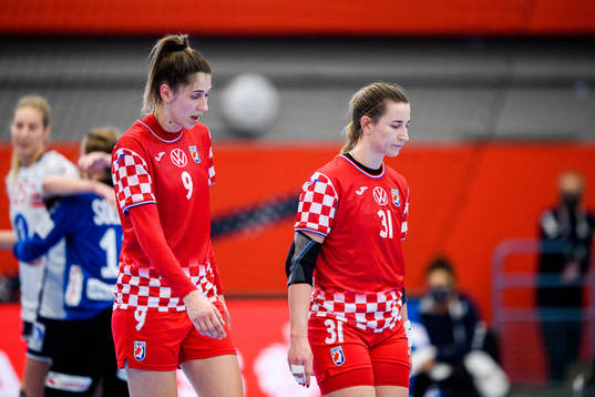 Camila Micijevic and Ana Debelic of Croatia looks dejected