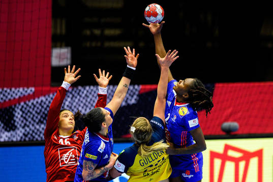 Isabelle Gullden of Sweden against goalkeeper Cleopatre