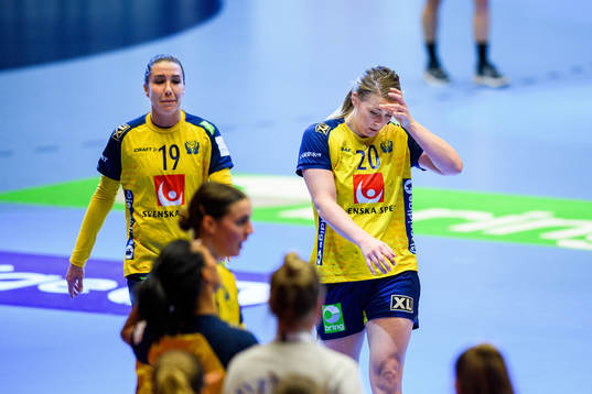 Anna Lagerquist and Isabelle Gullden of Sweden look dejected
