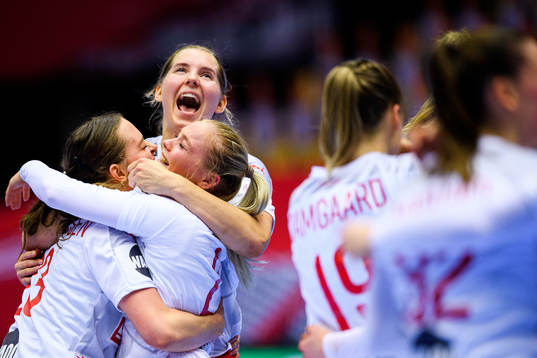 Players of Denmark celebrate
