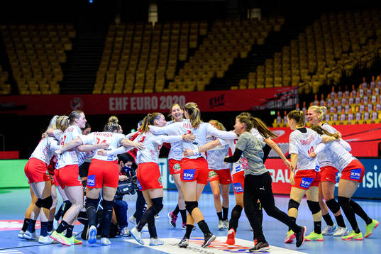 Players of Denmark celebrate