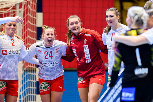 Players of Denmark celebrate