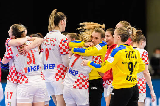 Goalkeeper Lucija Besen and Dora Krsnik of Croatia celebrate