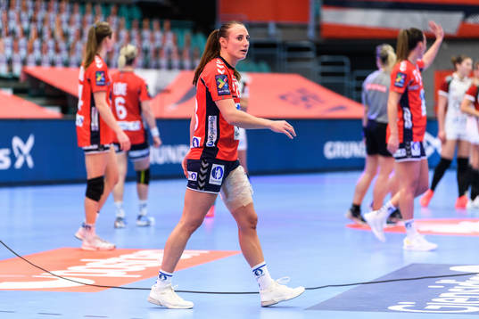 Camilla Herrem of Norway with a bandaged leg