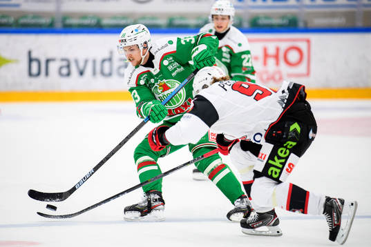 Rögles Niklas Hansson och Malmö Redhawks Carl Persson