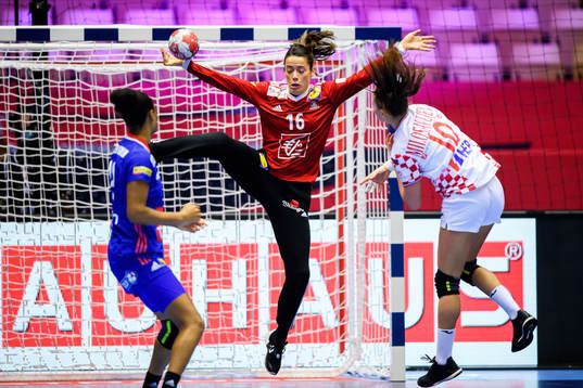 Dejana Milosavuevic of Croatia against goalkeeper Cleopatre