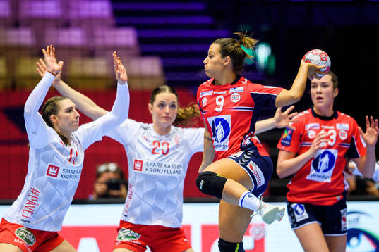Nora Mørk of Norway against Line Haugsted and Rikke