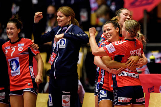 Nora Mørk and Stine Bredal Oftedal of Norway celebrate