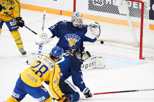 Jesper Frödén of Sweden scores the 3-0 goal
