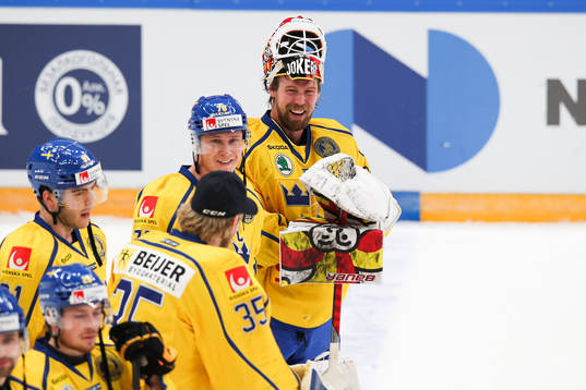 Dennis Rasmussen of Sweden and goalkeeper Anders