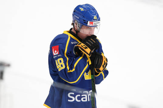 Jonathan Berggren of Sweden looks dejected