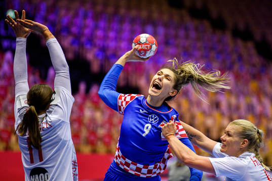 Camila Micijevic of Croatia and Kathrine Heindahl and Line