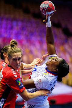 Marit Malm Frafjord of Norway and Grace Zaadi Deuna of