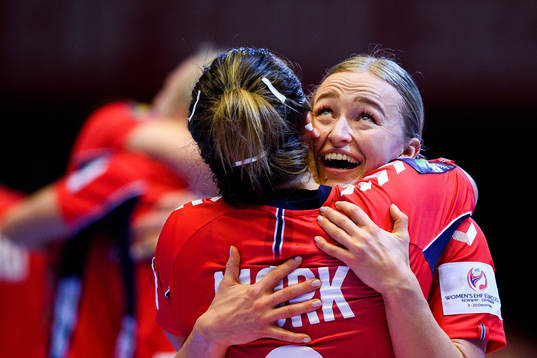 Nora Mørk and Stine Bredal Oftedal of Norway celebrate