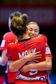 Nora Mørk and Stine Bredal Oftedal of Norway celebrate