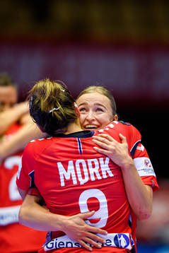 Nora Mørk and Stine Bredal Oftedal of Norway celebrate