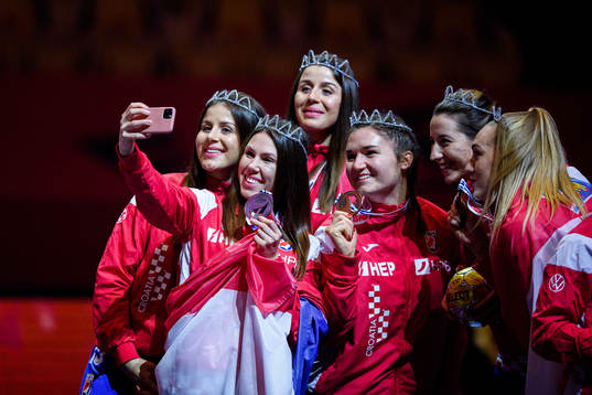 Players of Croatia celebrate with their bronze medals