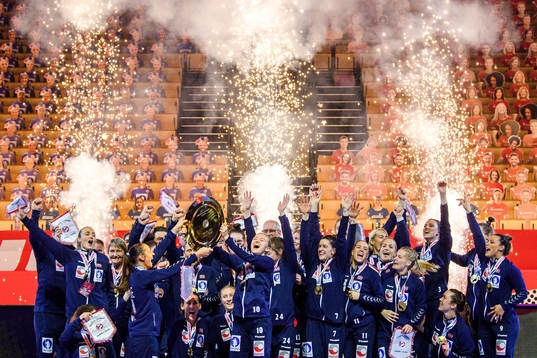 Players of Norway celebrate with the winner’s trophy