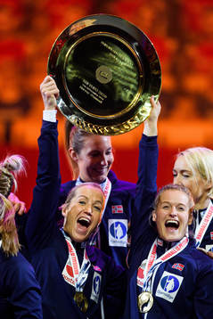 Heidi Løke of Norway celebrates with the winner’s trophy