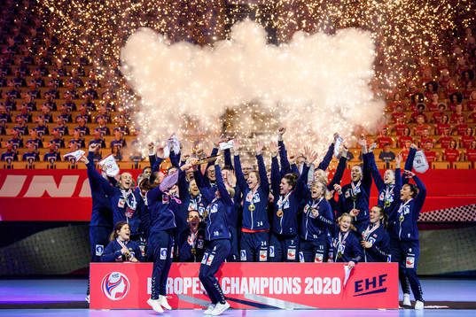 Players of Norway celebrate with the winner’s trophy
