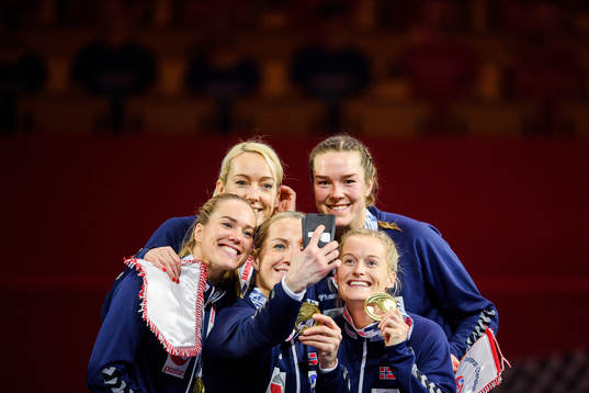 Heidi Løke of Norway takes a selfie with team-mates