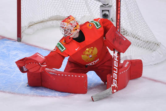 Yaroslav Askarov of Russia makes a save