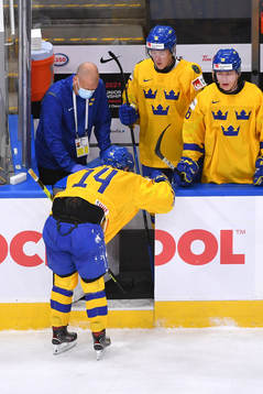 Arvid Costmar of Sweden leaves the ice