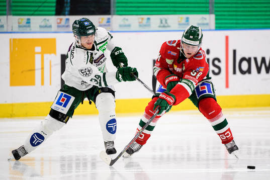 Färjestads Michael Lindqvist och Frölundas Jesper Sellgren