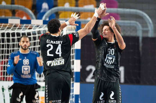 Ibrahim Elmasry and Ali Zein of Egypt celebrate