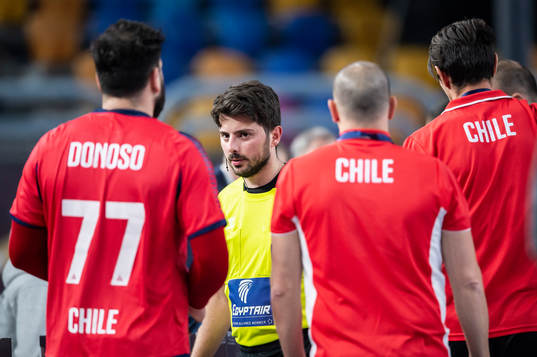 Players of Chile reacts against the referee