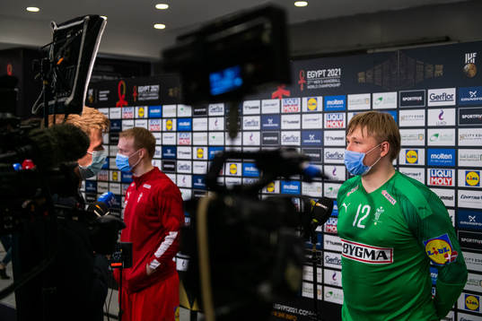 Magnus Jensen and goalkeeper Emil Nielsen of Denmark is