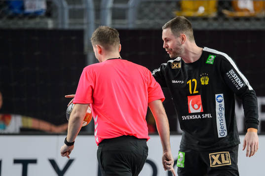 Goalkeeper Andreas Palicka of Sweden reacts against referee