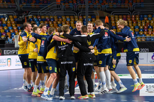 Players of Sweden celebrate