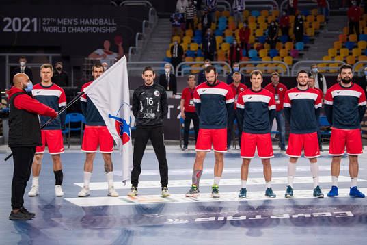 Players of Russia and the flag of the Russia handball