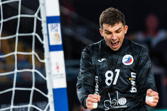 Goalkeeper Viktor Kireev of Russia celebrates