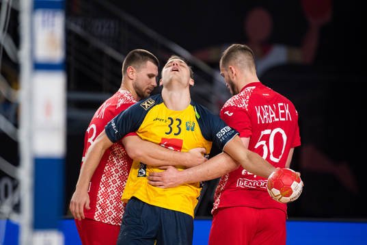 Lukas Sandell of Sweden with Uladzislau Kulesh and Artsem