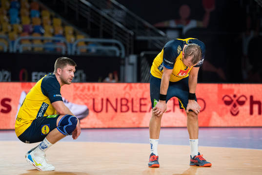 Linus Persson and Max Darj of Sweden looks dejected