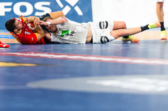 Alex Dujshebaev Dovichebaeva of Spain and Timo Kastening of