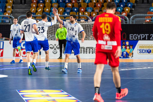 Roman Ostashchenko and Sergei Kudinov of Russia celebrate