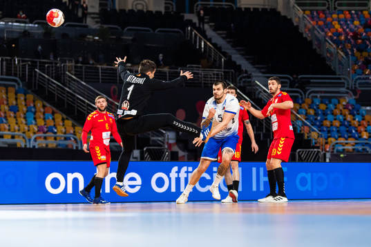 Goalkeeper Nikola Mitrevski of North Macedonia and Dmitrii