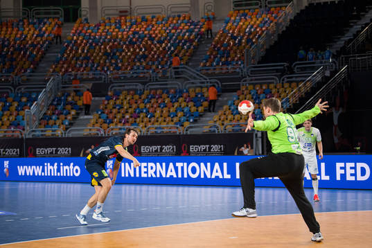 Hampus Wanne of Sweden against goalkeeper Urban Lesjak of