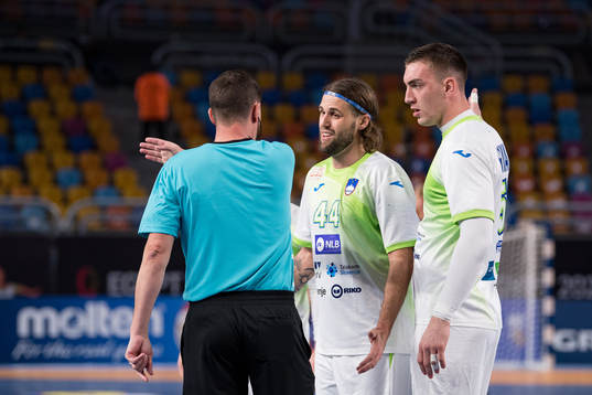 Dean Bombac and Nik Henigman of Slovenia reacts against the