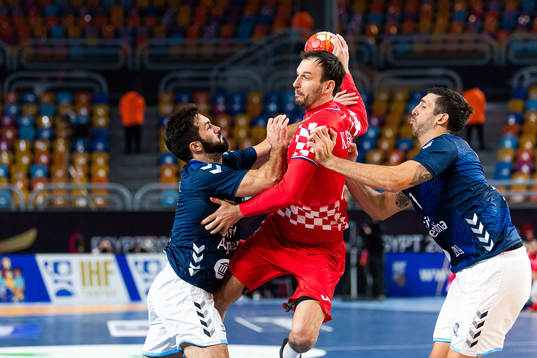 Ignacio Pizarro and Nicolas Bonanno of Argentina defend