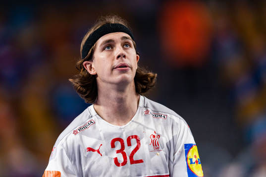 Jacob Holm of Denmark looks dejected