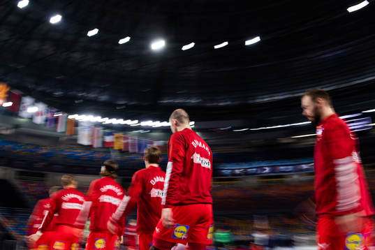 Players of Denmark enter the arena